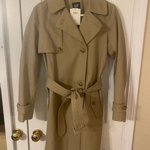 Trench coat size small. New with tags! Great for this fall/winter season.